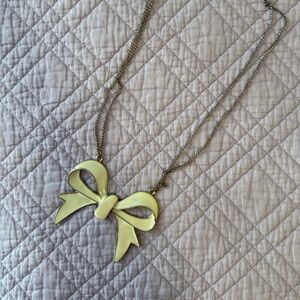 Cream Bow Pendant Necklace Metal Gold Accent - Costume Jewelry